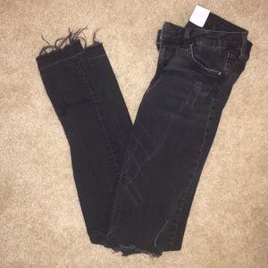 Distressed skinny jeans